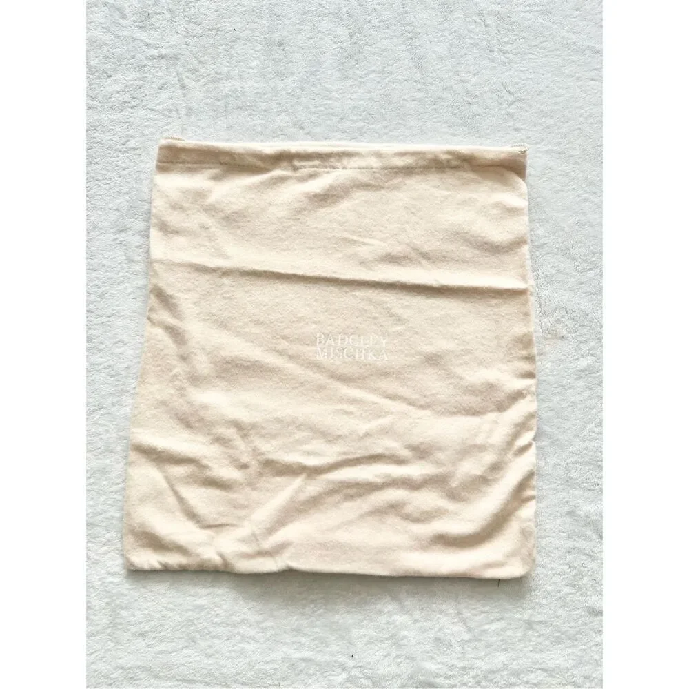 BADGLEY MISCHKA cream colored dust bag